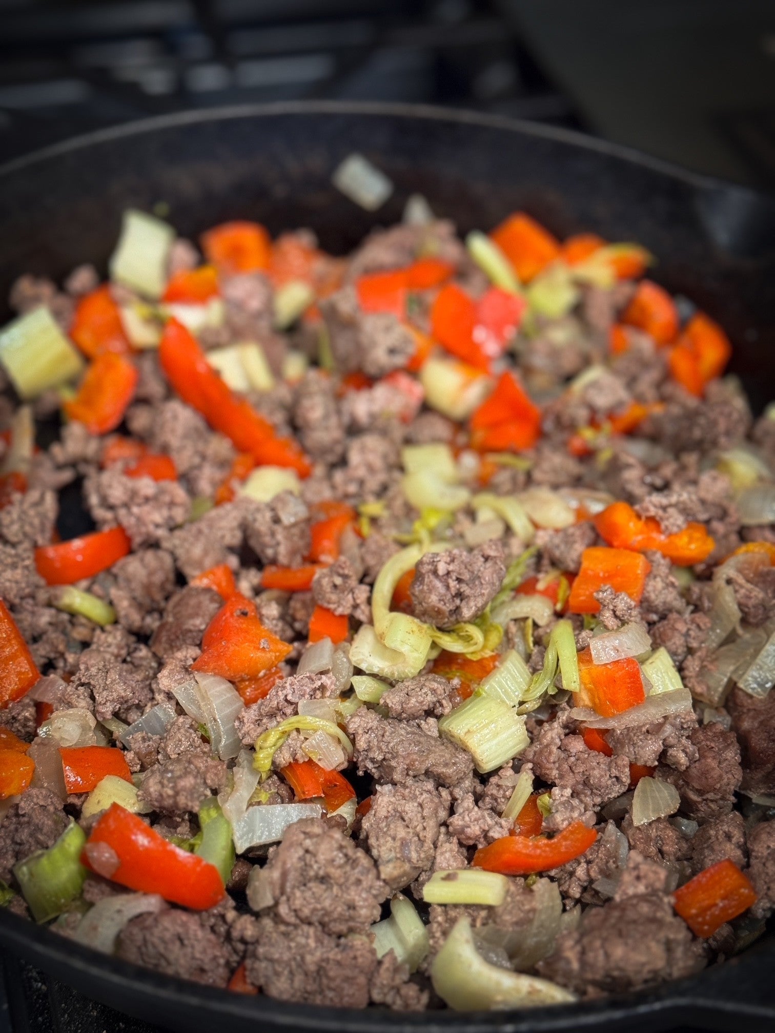 cooked ground beef with onions and peppers
